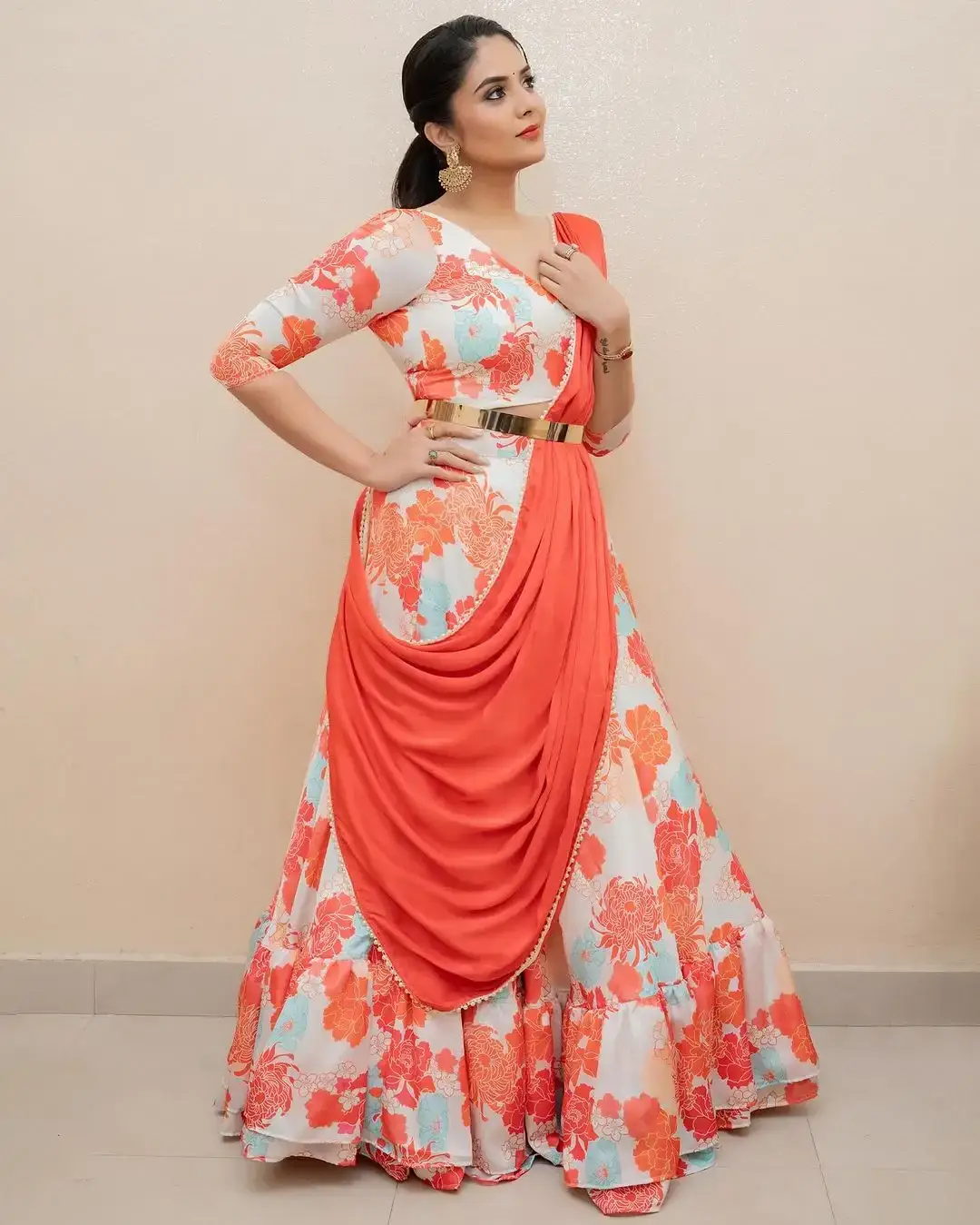 Beautiful Indian Actress Sreemukhi in Orange Lehenga Choli